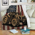 Rustic tractor blanket draped over a sofa, featuring patriotic stars and stripes artwork