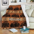 Rustic tractor throw blanket draped over a sofa with farm equipment artwork and southwestern-inspired patterns
