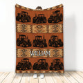 Tractor throw blanket displayed vertically with repeated farm tractor artwork and rustic geometric patterns