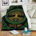 Tree Of Life throw blanket draped across a sofa with golden and green Celtic artwork