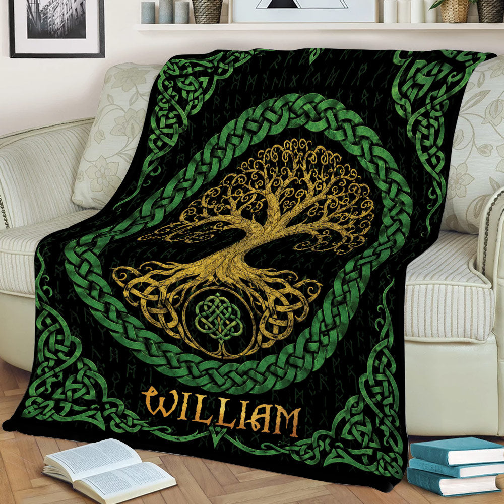 Celtic Tree Of Life blanket displayed on a sofa with ornate green knotwork borders