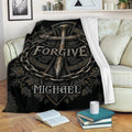 Christian cross blanket displayed on a sofa with ornate religious artwork and dark decorative details