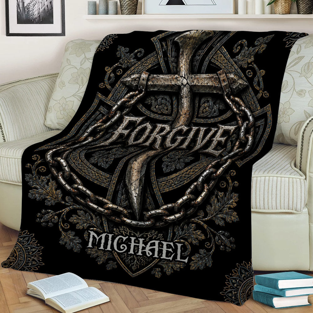 Christian throw blanket draped over a sofa, featuring an ornate cross, chains, and intricate faith-inspired patterns