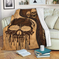 Skull Throw Blanket draped over a sofa with vintage brown leather-look artwork