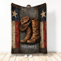 Rustic cowboy blanket displayed with a leather hat, Western boots, star panels, and distressed patriotic artwork