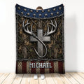 Fishing blanket featuring a large metallic hook, antlers, woodland camouflage, stars, and rugged outdoor artwork
