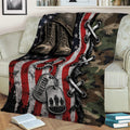 Military veteran throw blanket draped over a sofa with boots, helmet, dog tags, and patriotic colors