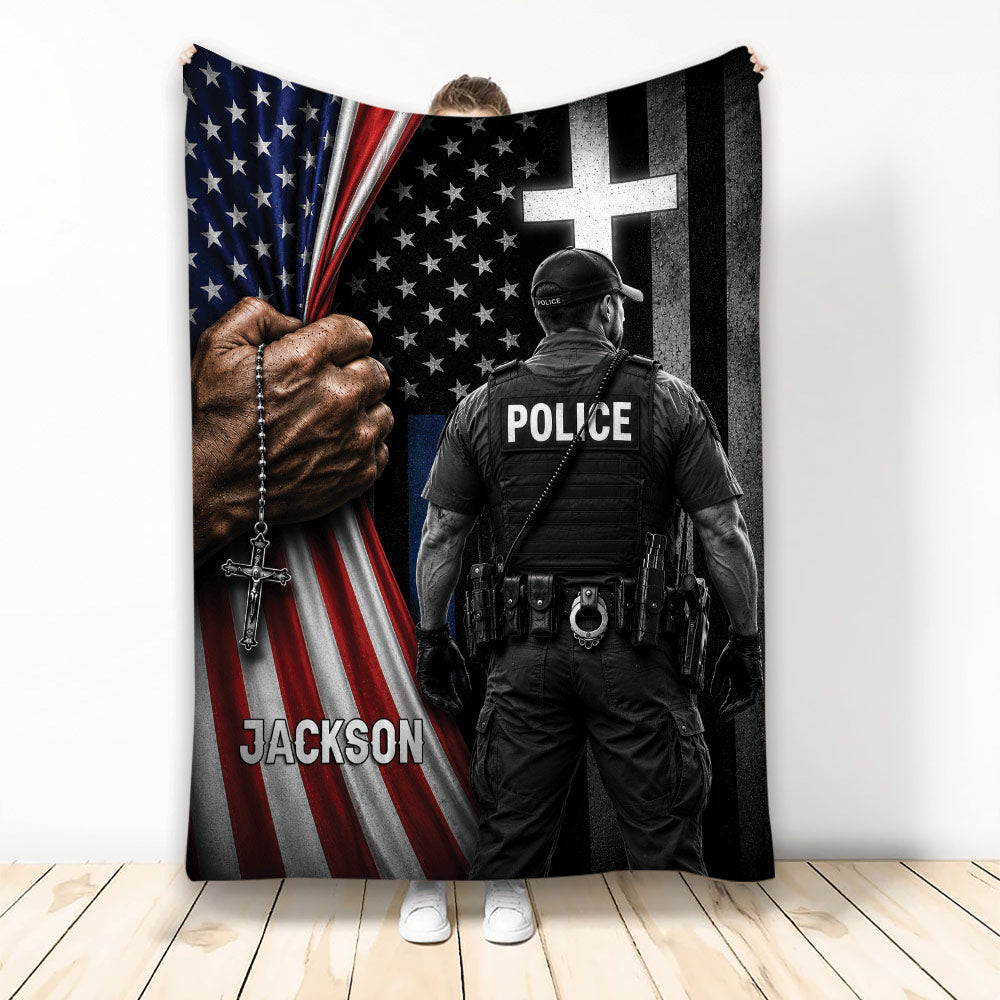 Police throw blanket featuring a uniformed officer, American flag stripes, stars, cross, and bold patriotic artwork