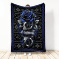 Police throw blanket featuring a blue rose, silver handcuffs, and black and blue geometric artwork