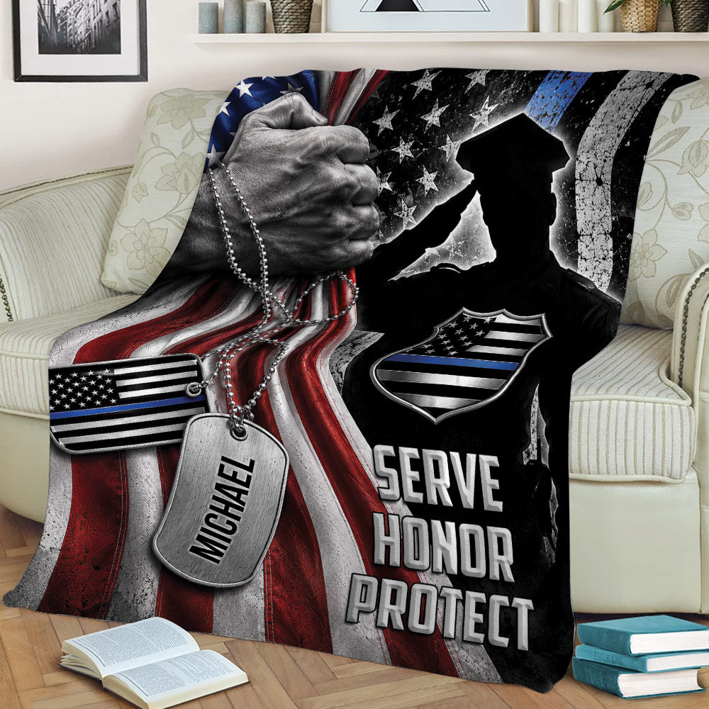 Law enforcement throw blanket draped over a couch with officer artwork