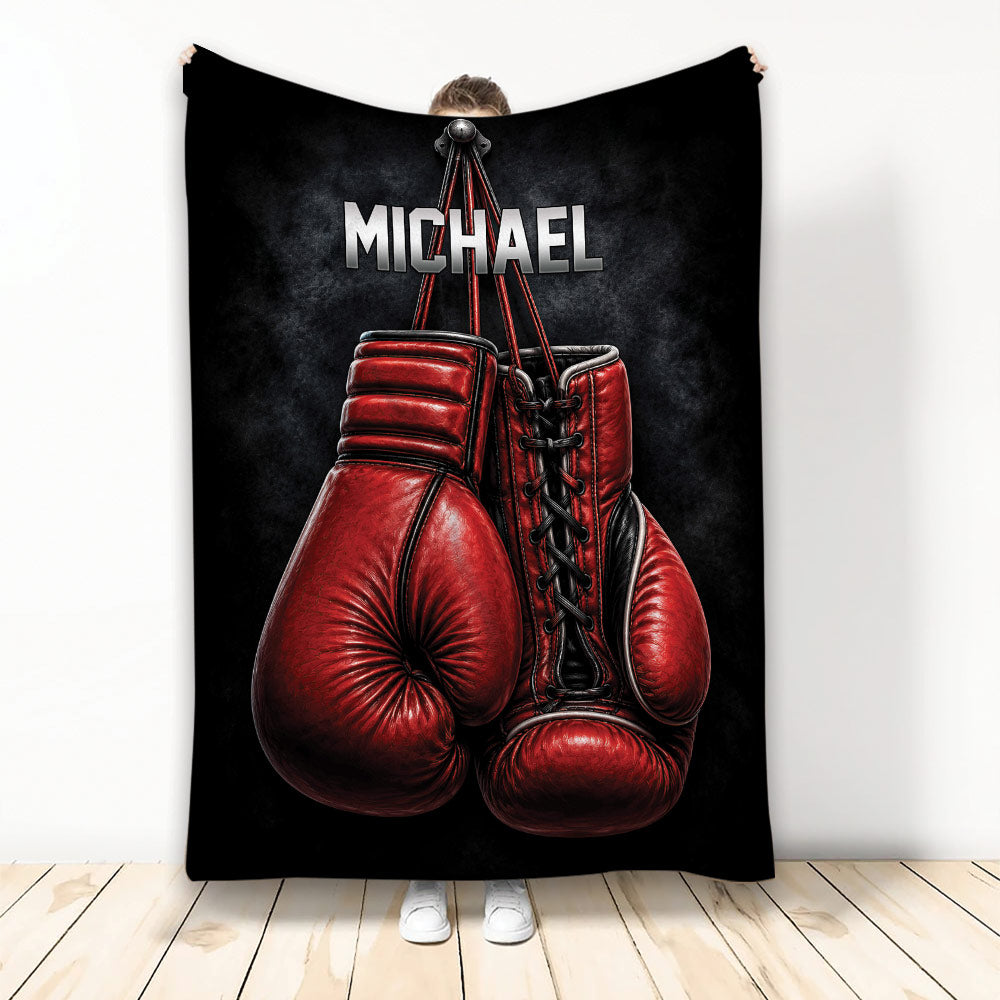 Boxing throw blanket displayed upright with dramatic red gloves on a black background