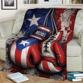 Close lifestyle view of a boxing throw blanket with oversized gloves and bold red, white, and blue graphics