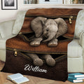 Custom elephant blanket draped over a couch, showcasing a lifelike elephant and zipper-inspired artwork