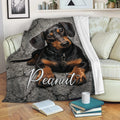 Black and tan Dachshund throw blanket styled across a cozy living room sofa