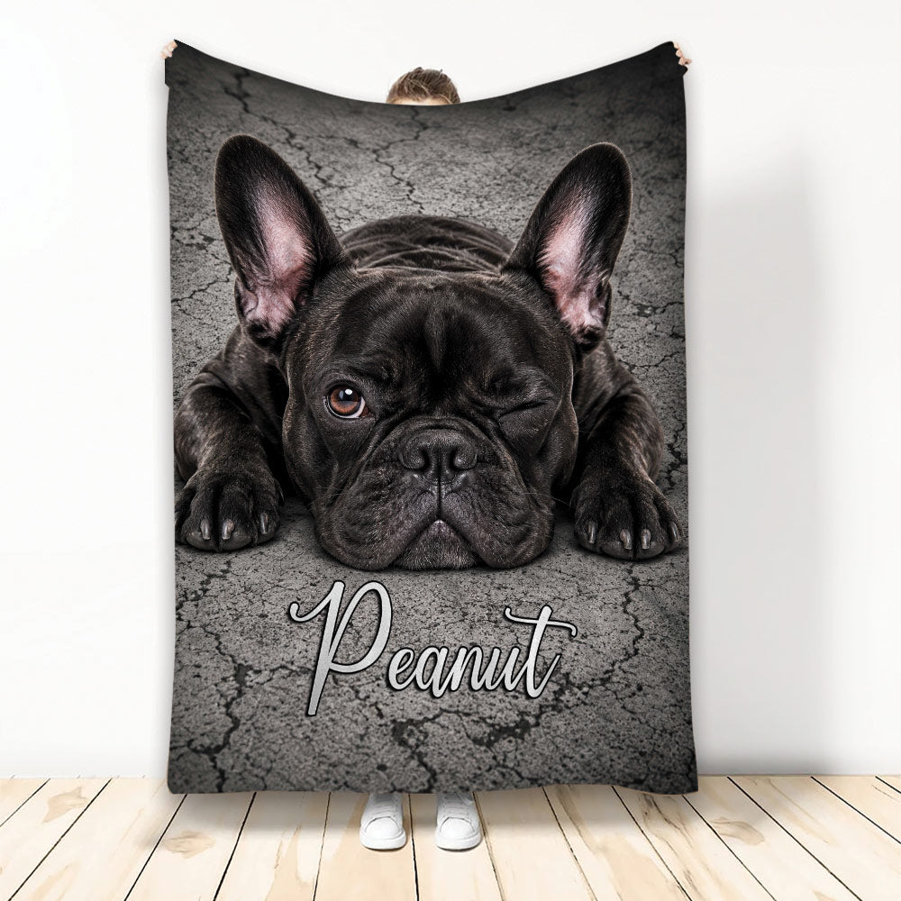 French Bulldog throw blanket featuring a winking black Frenchie on a cracked gray background