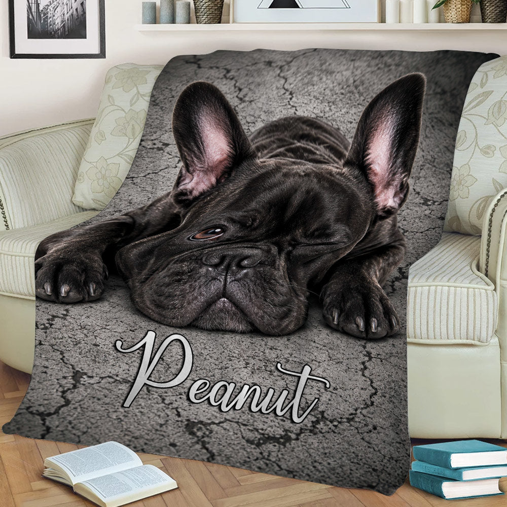 Black French Bulldog throw blanket displayed across a sofa with cozy living room styling
