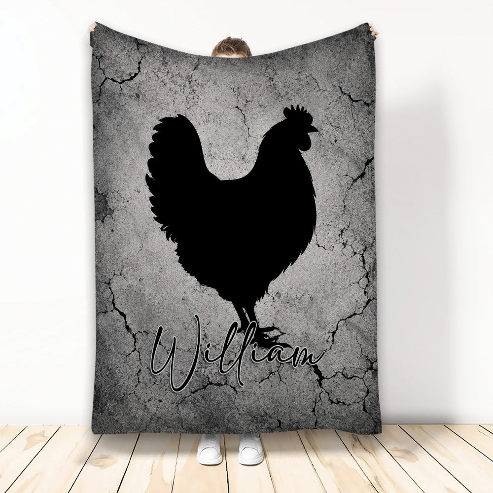 Black chicken silhouette blanket with a rustic cracked gray stone background