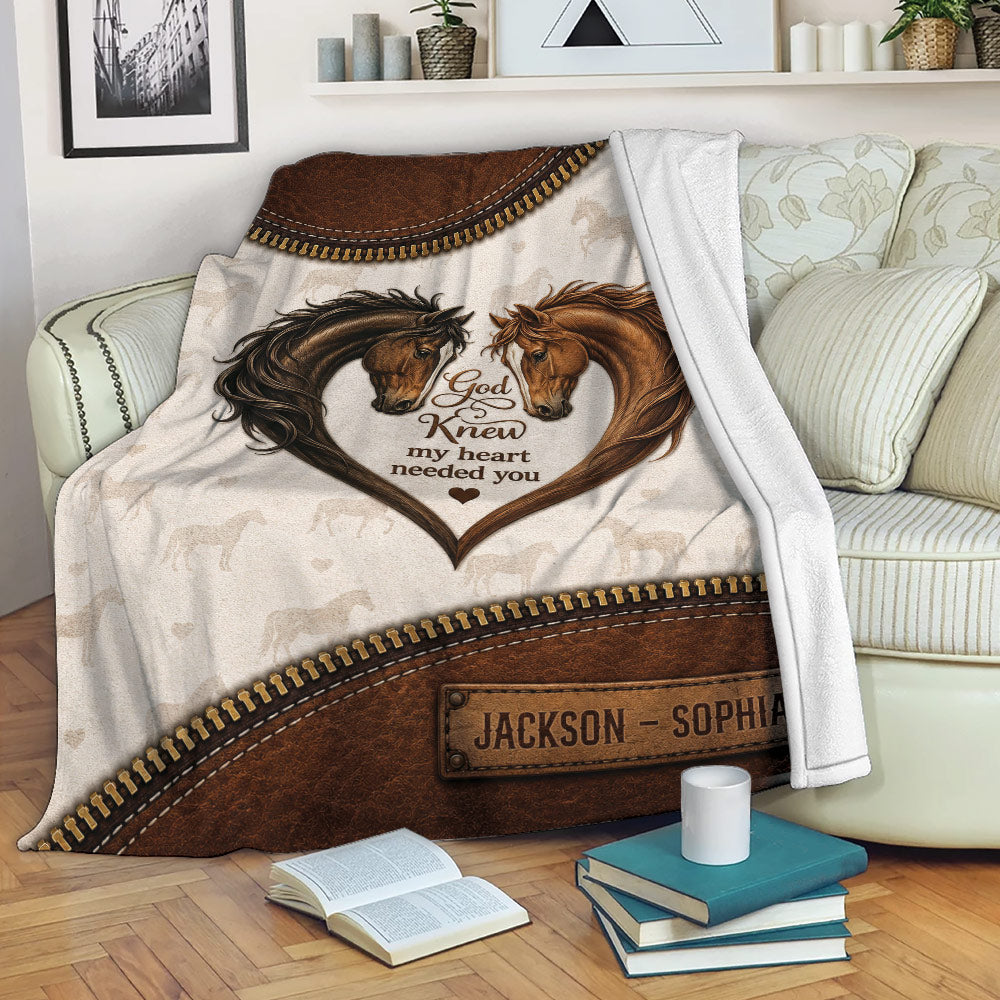 Rustic horse throw blanket draped over a sofa with heart-shaped horse artwork