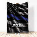 Police throw blanket with black and silver flag design, blue line detail, and star pattern