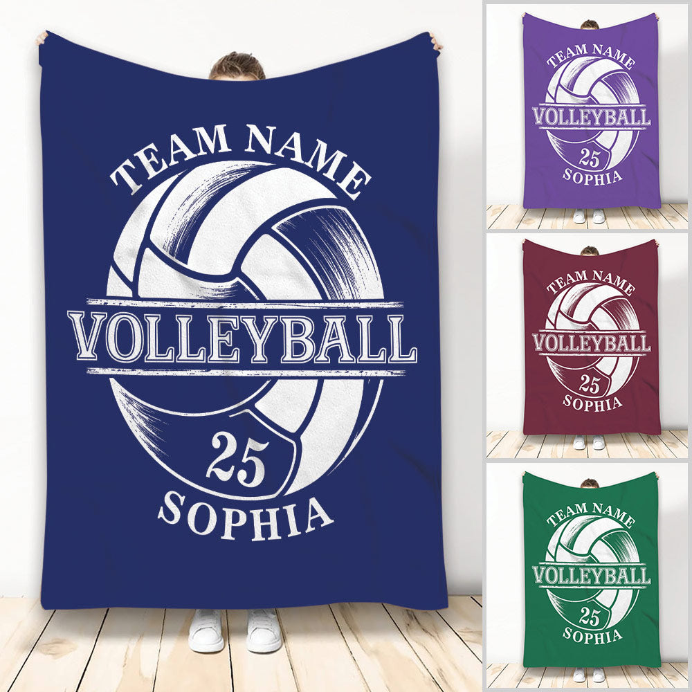 Volleyball throw blanket with bold ball artwork shown in navy, purple, maroon, and green color options