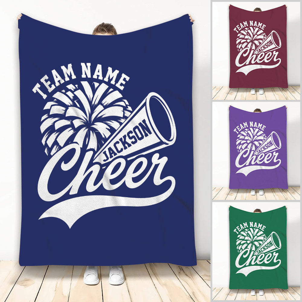 Cheerleading throw blanket with pom-pom and megaphone artwork shown in multiple team colors