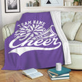 Purple cheerleading blanket draped over a sofa with pom-pom and megaphone design