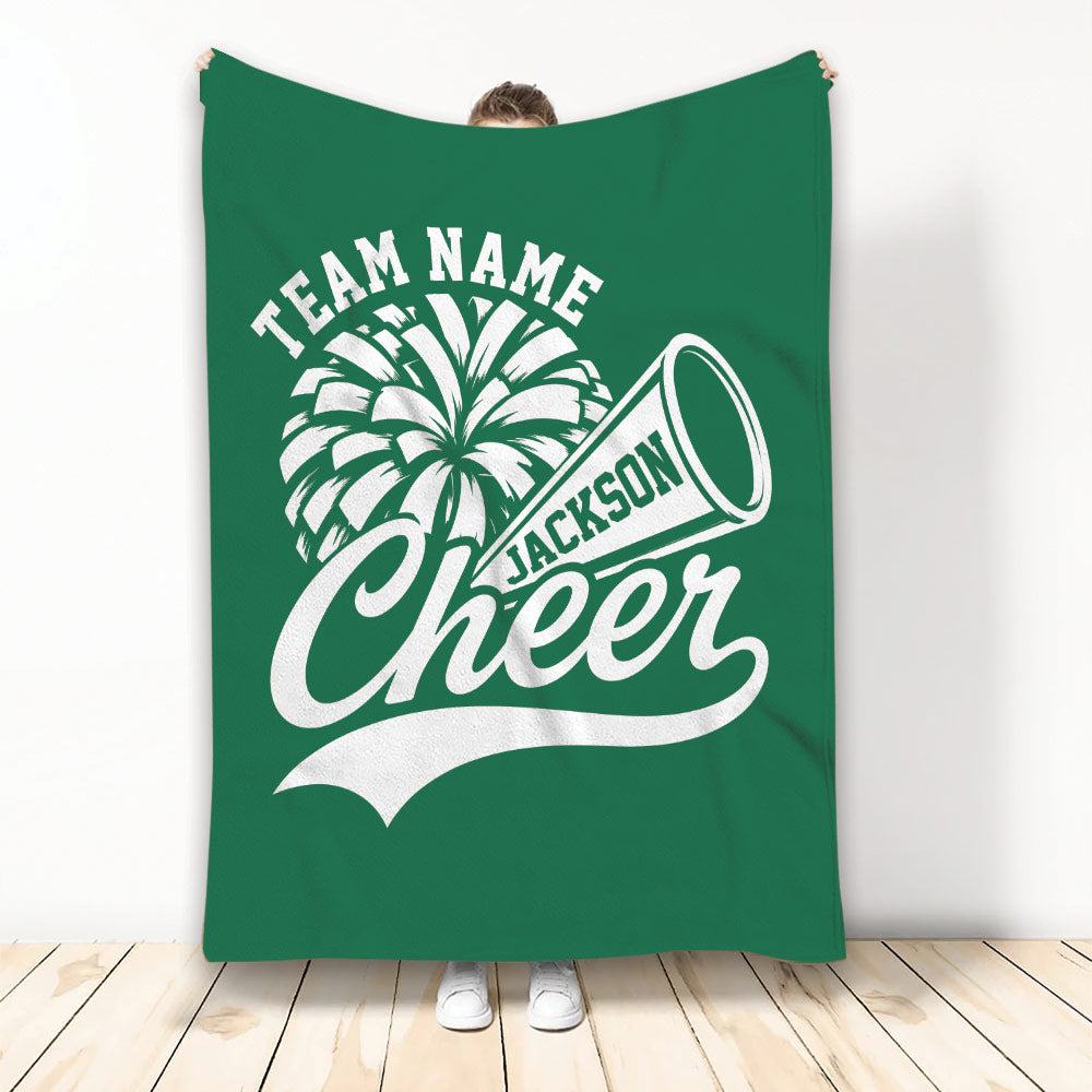 Green cheerleading throw blanket featuring bold pom-pom and megaphone artwork