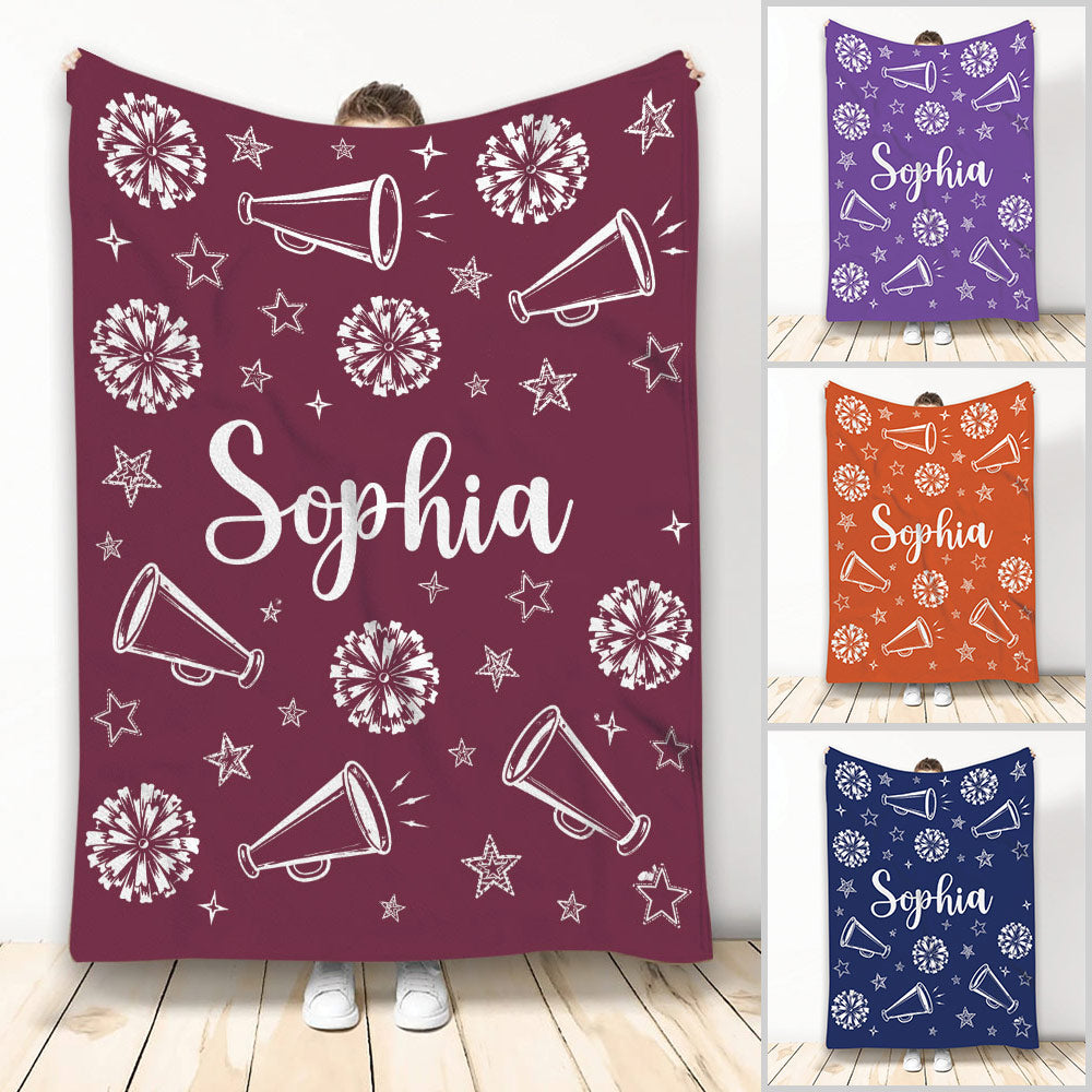 Cheerleading throw blanket display with pom-poms, megaphones, stars, and multiple color options