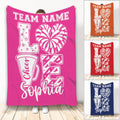 Pink cheerleading throw blanket with pom-pom, megaphone, star, and cheer squad artwork