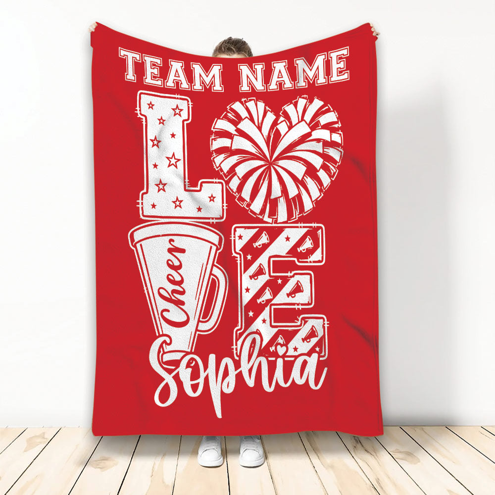 Red cheerleading blanket featuring bold pom-pom, megaphone, star, and cheer design
