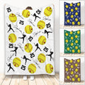 Softball throw blanket with yellow softball artwork, player silhouettes, hearts and varied color designs
