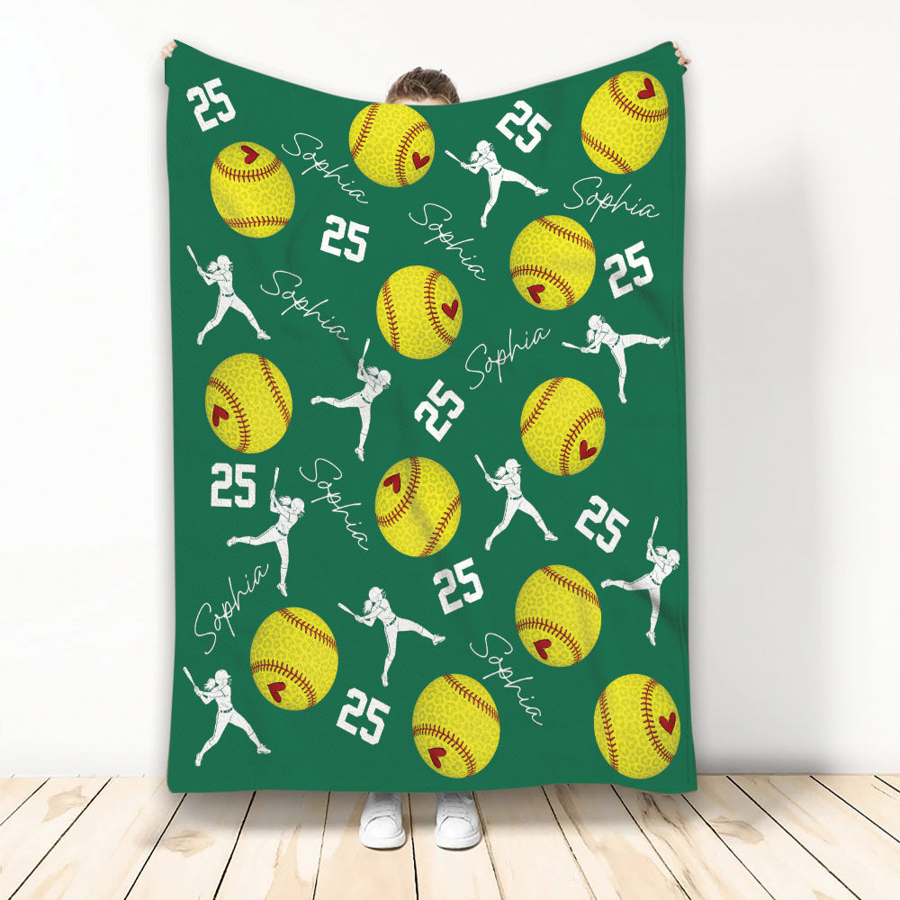 Green softball blanket featuring yellow softballs and white softball player silhouettes