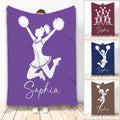 Purple cheerleading blanket with a jumping cheerleader silhouette holding pom-poms