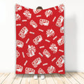 Red cheerleading throw blanket featuring white megaphone, pom-pom, and heart graphics