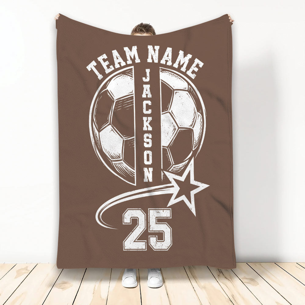 Brown soccer throw blanket displayed vertically with vintage soccer ball and star artwork