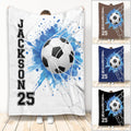 Soccer throw blanket with a ball in a goal net, blue paint splash artwork, and multiple color options