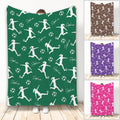 Green soccer throw blanket featuring repeating female player silhouettes, soccer balls, and decorative script
