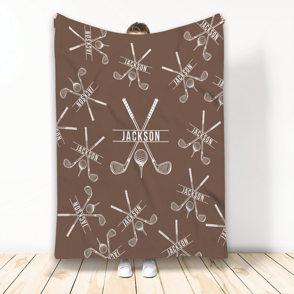Brown custom golf throw blanket featuring repeating golf club and golf ball illustrations