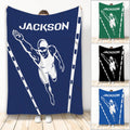 Blue swimming throw blanket featuring a dynamic swimmer illustration and lane-style border