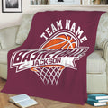 Maroon basketball throw blanket draped over a sofa with bold graphic hoop artwork