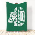 Green football throw blanket displaying a helmeted player holding an oval football