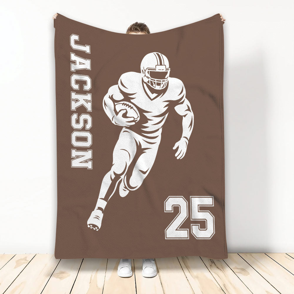 Brown football blanket featuring a helmeted ball carrier and large athletic jersey-style number graphic