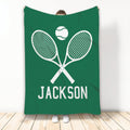 Green tennis blanket featuring crossed white rackets and a tennis ball design