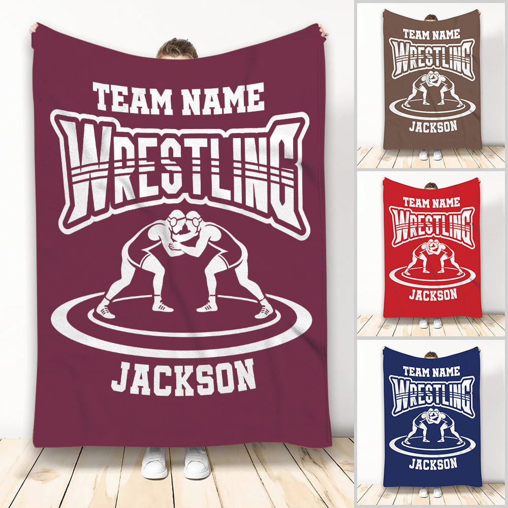 Wrestling throw blanket shown in multiple colors with wrestler artwork and bold team-style design
