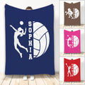 Volleyball throw blanket with a white player silhouette and volleyball artwork shown in several bold color options