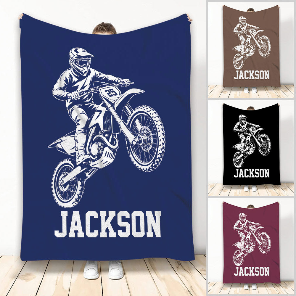 Custom motocross blanket featuring a helmeted dirt bike rider in bold white artwork on color choices