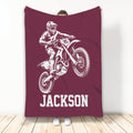 Maroon motocross blanket displaying a helmeted dirt bike rider and bold sports graphic