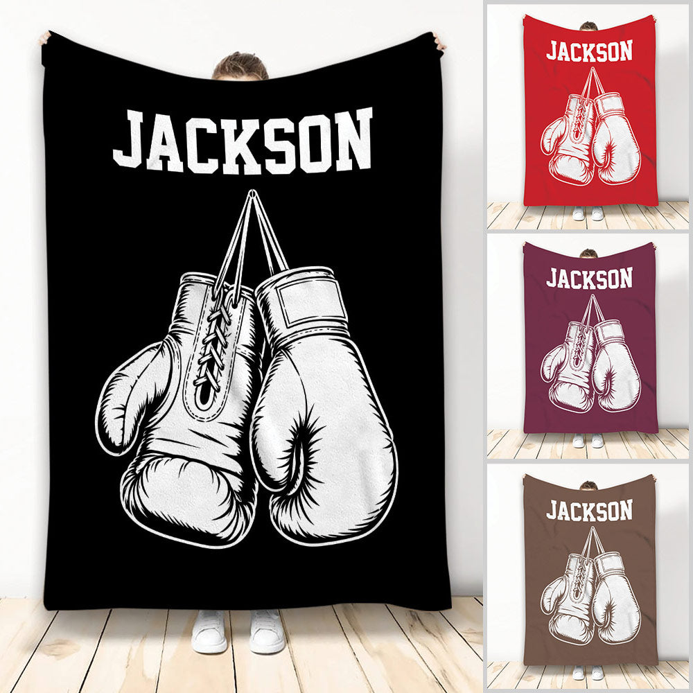 Boxing throw blanket with bold white boxing glove artwork on a black background