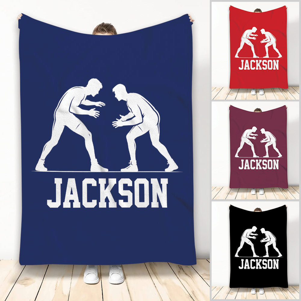 Wrestling throw blanket with two grappler silhouettes in white on a navy background
