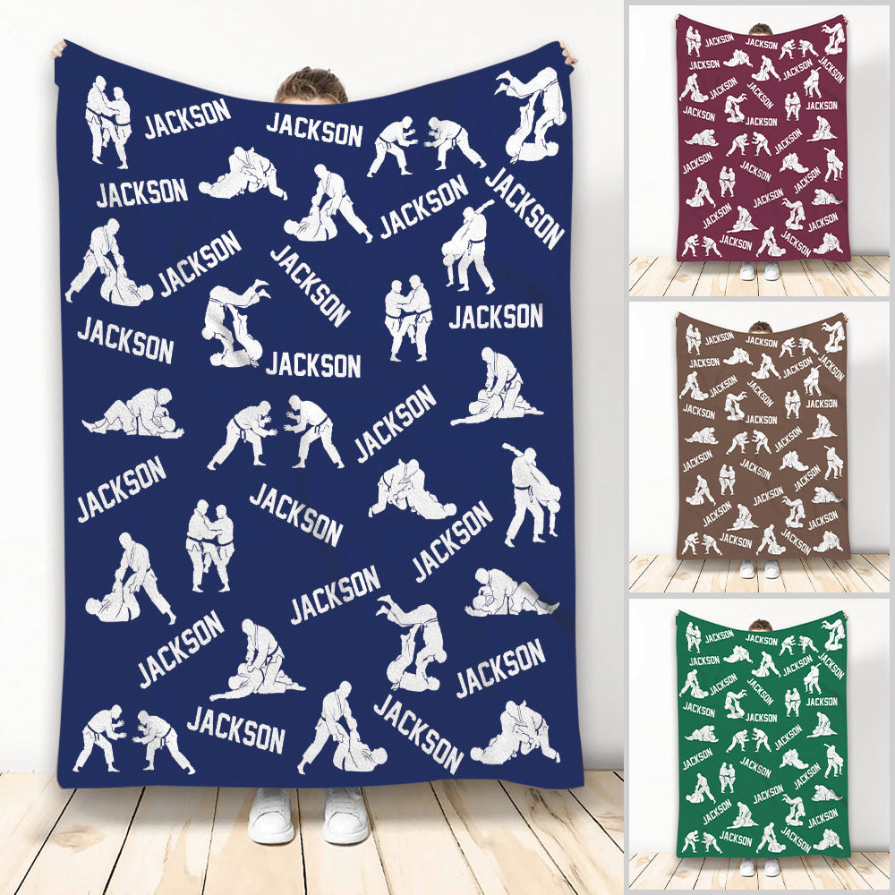 Jiu Jitsu throw blanket with white grappling silhouettes on a navy background in multiple color options